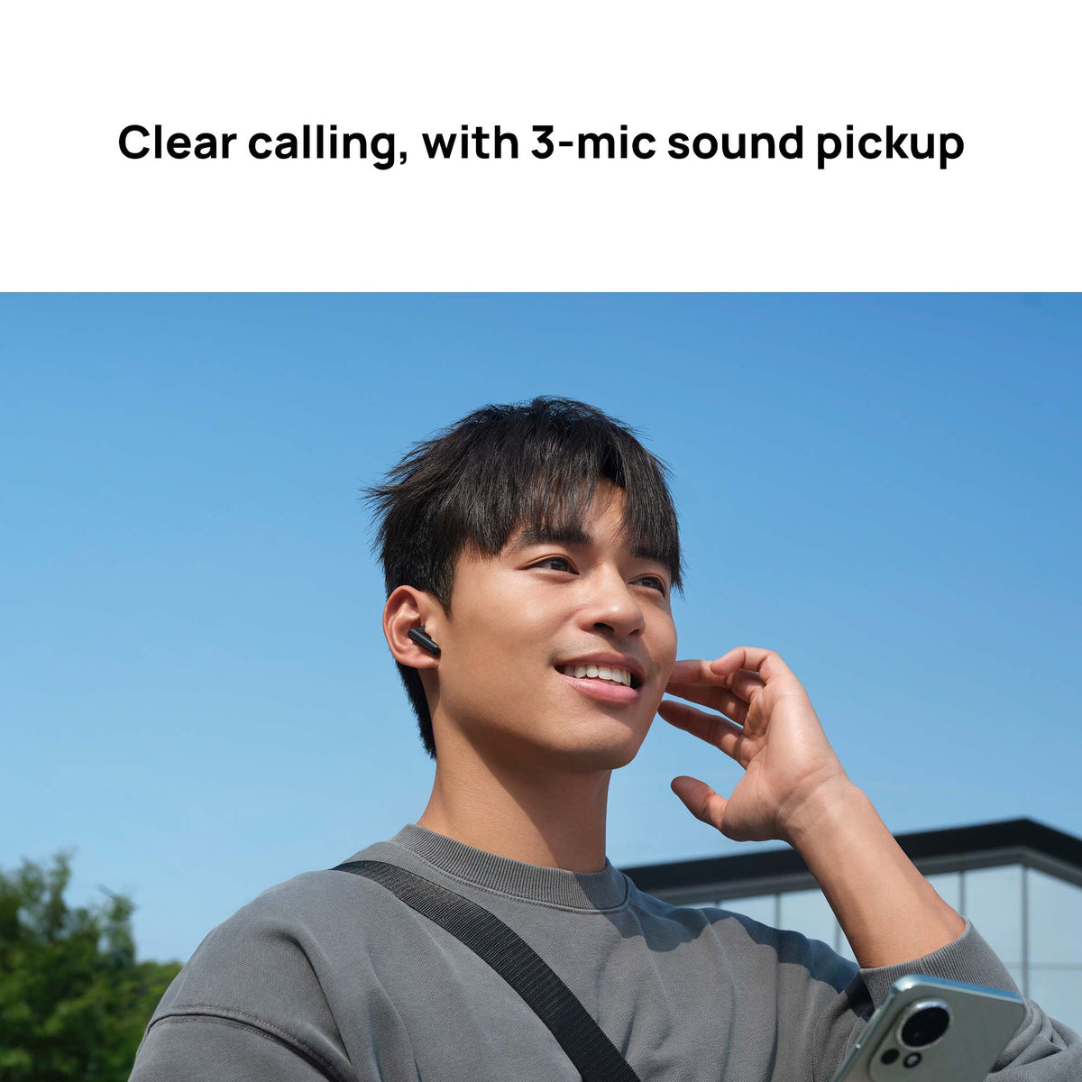 Man talking on a phone with clear calling feature text above him