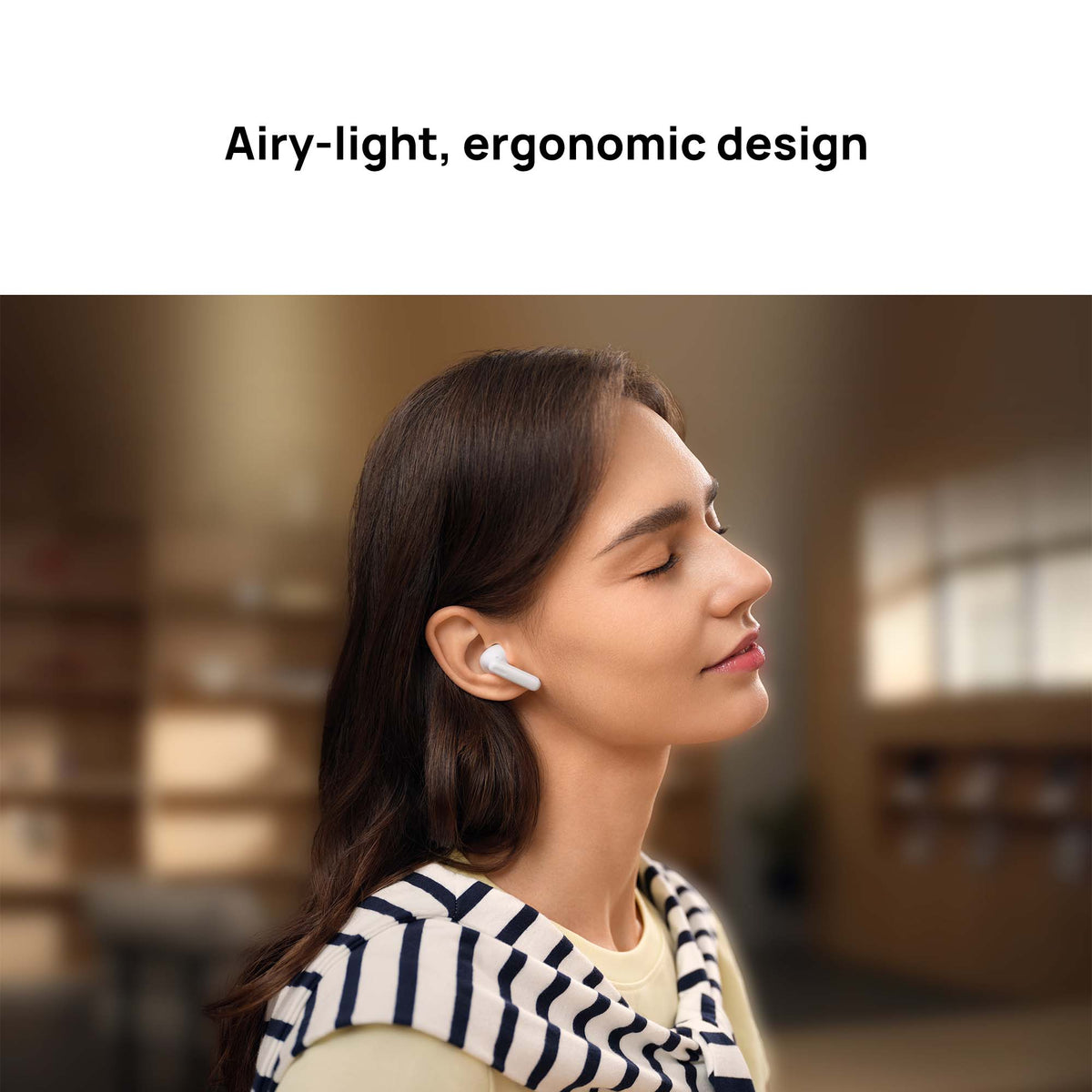 Woman wearing wireless earbuds with text 'Airy-light, ergonomic design' above her.