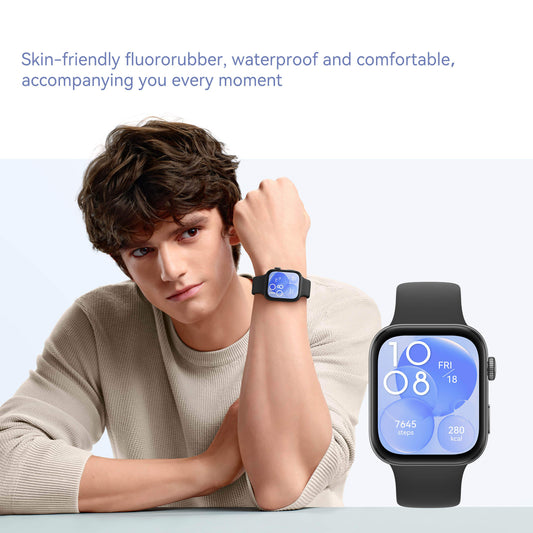 Person wearing a smartwatch with a close-up of the watch face on a light background
